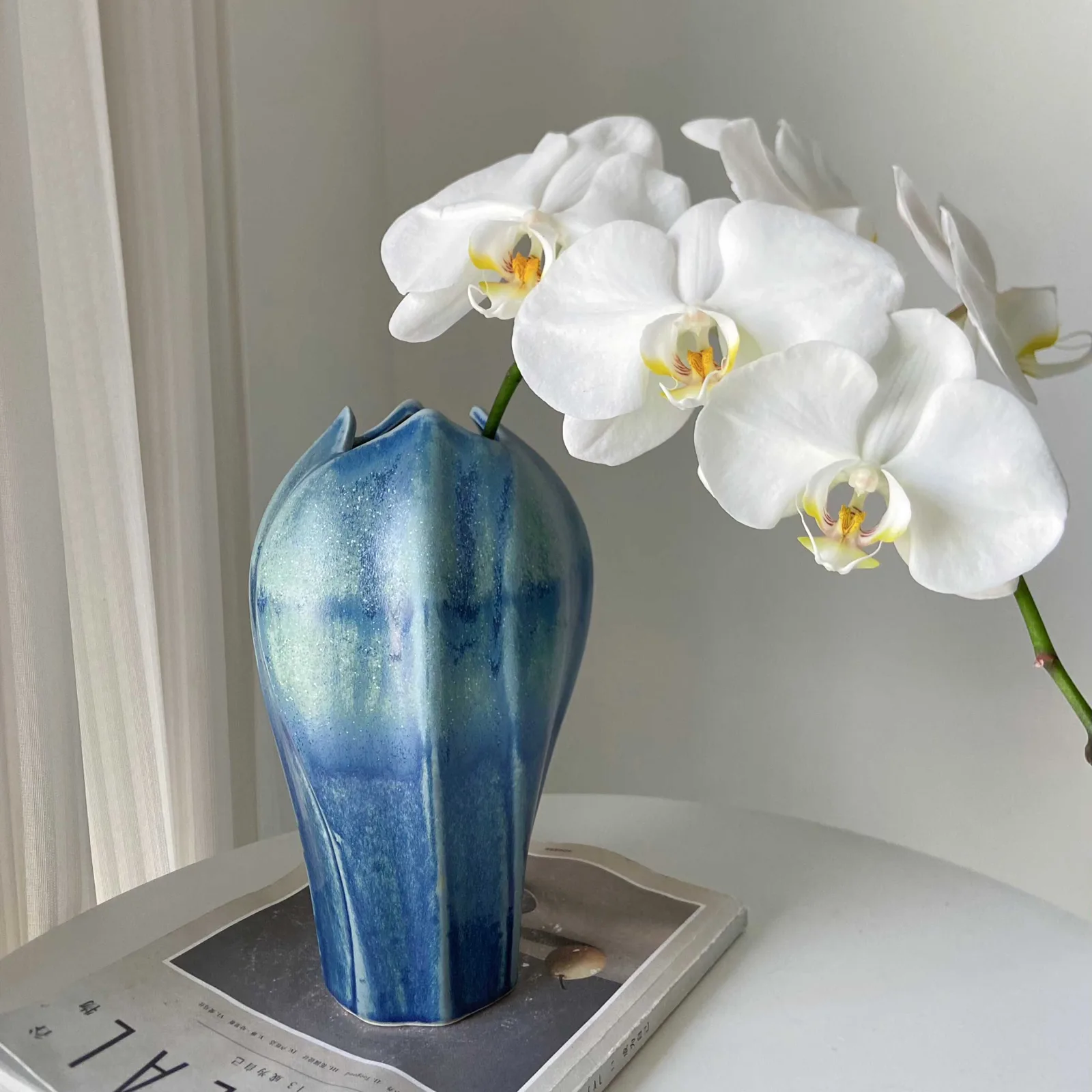 Flower Bud Ceramic Vase With Flowing Blue Glaze